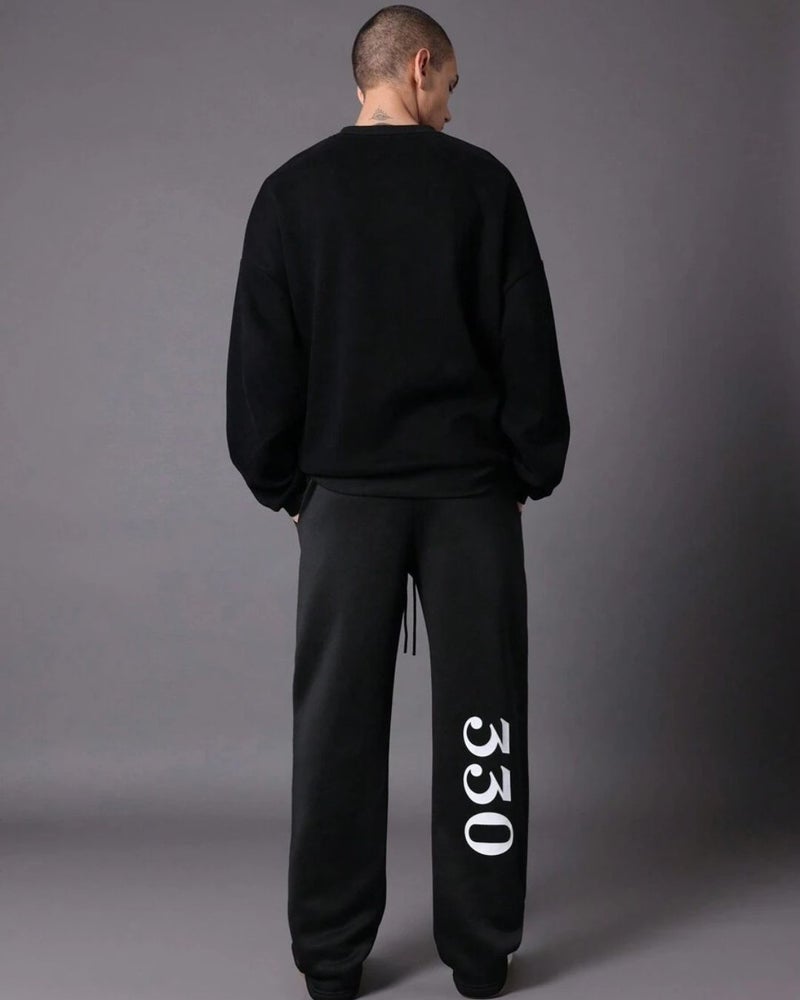 فلاينوف بنطلون رياضي أسود مطبوع بقصة فضفاضة - Image 3